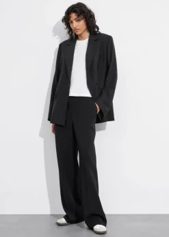 Pantalon Large à Plis Marqués