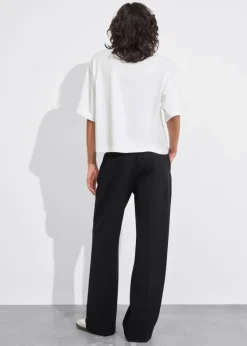 Pantalon Large à Plis Marqués